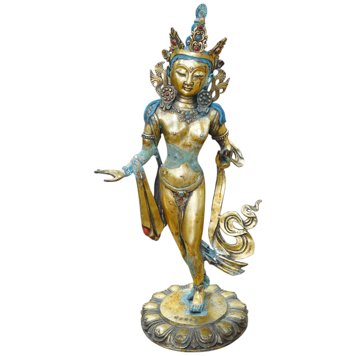 A Tibetan brass model of Goddess Tara, inscription to base reads ‘Ming Dynasty Yongle year’, 53cm. Condition - poor to fair